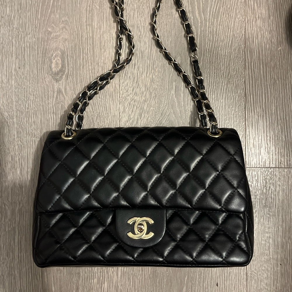 CHANEL Black Quilted Shoulder Bag with Gold Accents